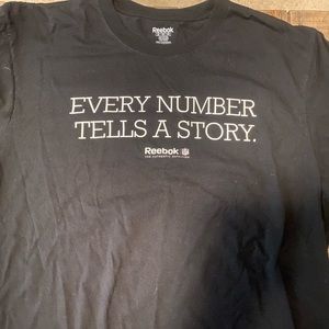 Reebok every number tells a story tee shirt